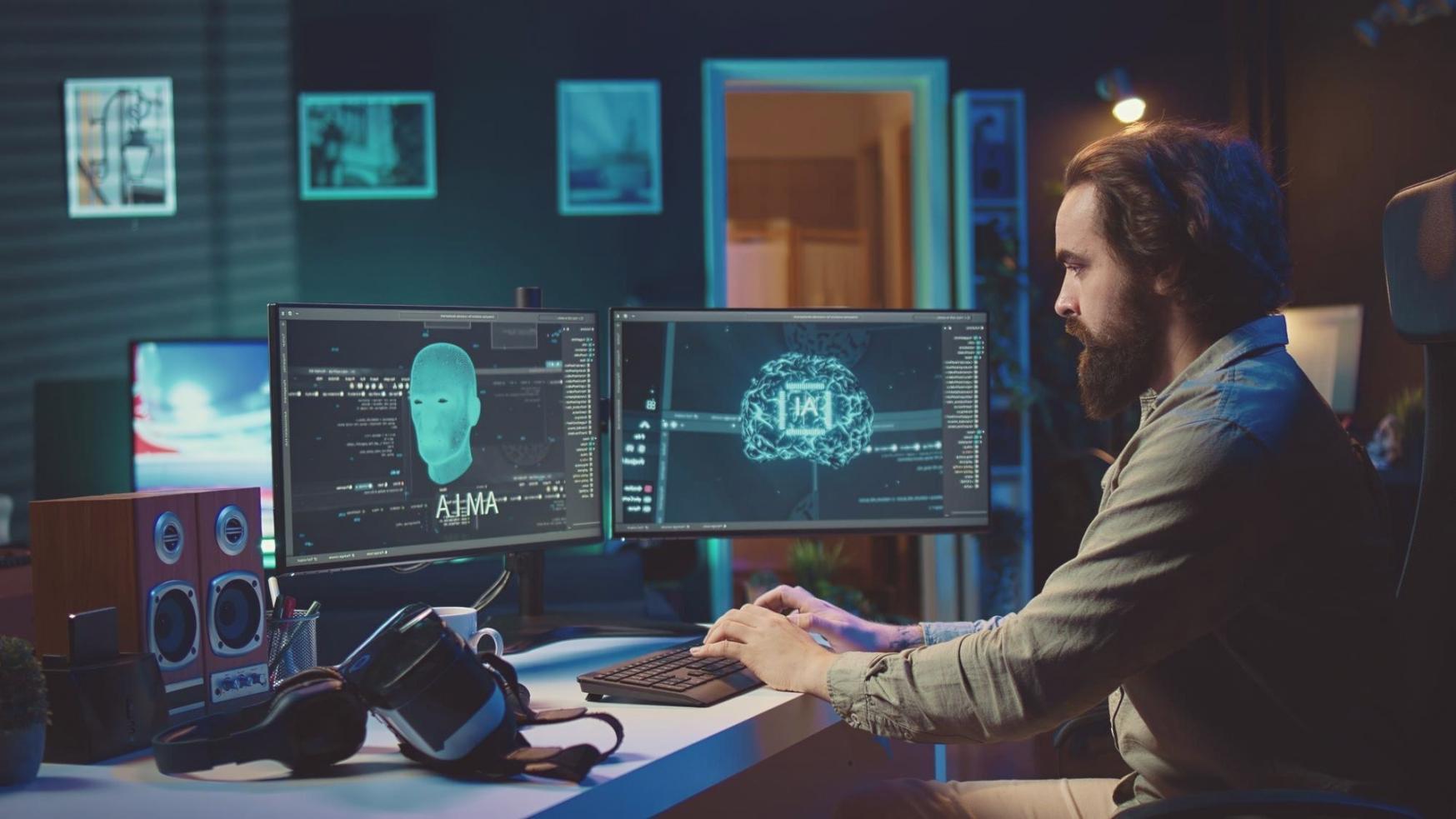 Moderne Spieleentwicklung am Computer mit mehreren Bildschirmen